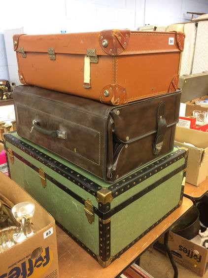 Two suitcases and a trunk