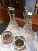 Pair of claret jugs and pair of wine coasters