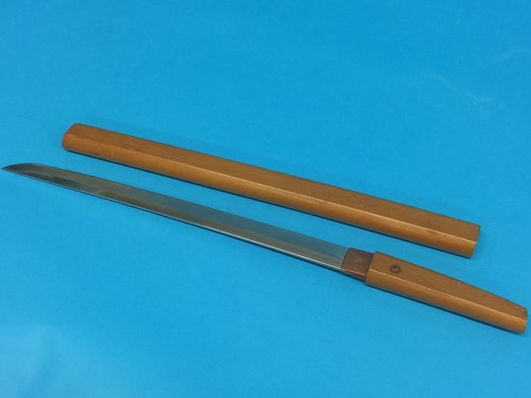 A Japanese wood mounted Wakizashi, length of blade 40.5cm