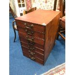 A set of Office filing drawers with seven drawers. 36cm wide