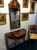 A modern red lacquered Oriental design mirror, half moon table and a carver chair (3)