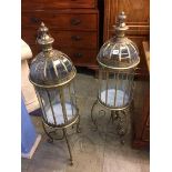 Pair of brass and glass lanterns on stands