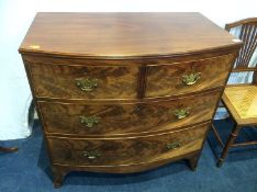 A 19th century mahogany bow front chest of drawers with 2 short and 2 long drawers, 92cm wide