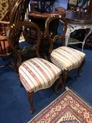 A pair of Victorian chairs