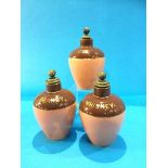 Three stoneware decanters; Gin, Whiskey and Brandy (3)