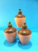 Three stoneware decanters; Gin, Whiskey and Brandy (3)