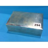 A silver cigarette box