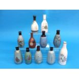 A collection of eleven Japanese World War II military sake bottles