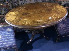 A Victorian oval walnut and marquetry inlaid centre table