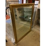 A gilt framed mirror