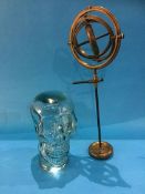 A Gyroscope and a glass skull