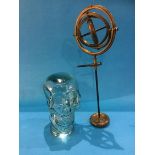 A Gyroscope and a glass skull