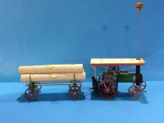 A boxed Mamod steam tractor and lumber wagon
