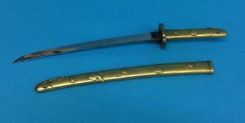 A 19th century brass 'tourist' dagger, c1880, the mon is the family crest for the Katabami family,