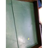 A mahogany folding campaign table with green leather inset