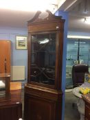 An Edwardian mahogany astragal glazed corner cabinet, with box wood stringing, inlay and swan neck