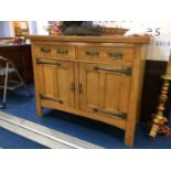 An oak Arts and Crafts Golden Oak sideboard, 118 x 48 x 103cm