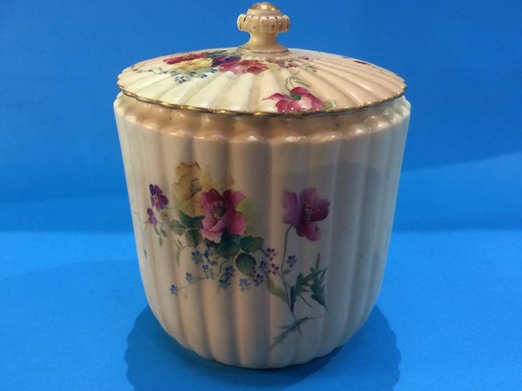 A Royal Worcester blush ivory lidded pot