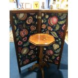 A mahogany occasional table and a two fold screen