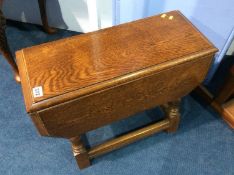 A small oak drop flap coffee table