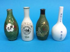A rare Japanese World War II Imperial army green coloured sake bottle, a raised basket weave sake