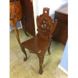 A Victorian mahogany carved hall chair