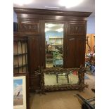 An Edwardian mahogany triple wardrobe