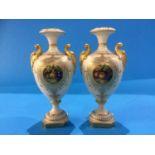A pair of Royal Worcester baluster form vases, with central roundels painted with fruit by Edward