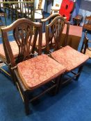 A set of four single country style chairs