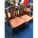 A set of four single country style chairs