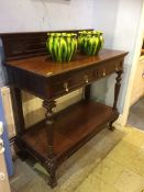 An Edwardian mahogany serving table