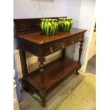 An Edwardian mahogany serving table