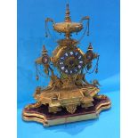 A gilt metal mantle clock, the movement stamped 'W.H. Tooke Paris'