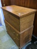 A pine chest on stand