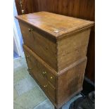 A pine chest on stand