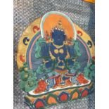 An elaborately painted Tibetan Thangka