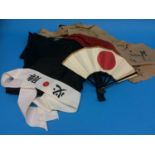 A Japanese 'Lucky' flag, a Japanese fan, headband and a pair of trousers and top