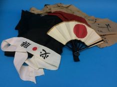 A Japanese 'Lucky' flag, a Japanese fan, headband and a pair of trousers and top