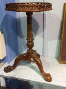 A reproduction mahogany octagonal occasional table