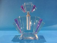 A large Art Deco style glass scent bottle