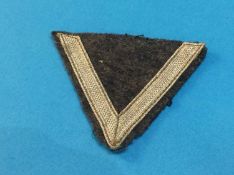 An Army Gefrieter Sleeve Chevron