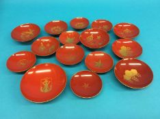 A set of three Japanese Imperial army red lacquered sake cups, Russian - Japanese war 1904, and a