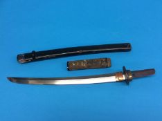 A Japanese Wakizashi, signed with lacquered scabbard, length of blade 37cm