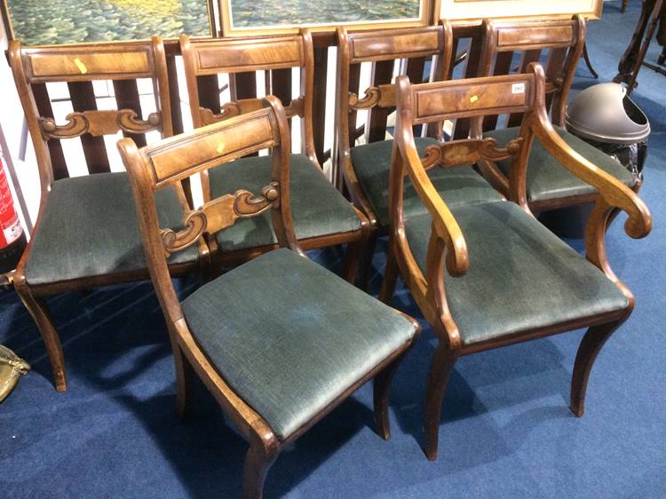A set of 19th century mahogany dining chairs, comprising five single and one carver