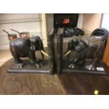 Pair of ebony elephant book ends