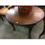 A mahogany extending dining table, by James Shoolbred, London