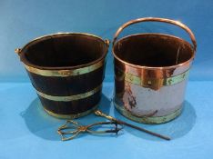 An oak brass bound bucket and a copper and brass bucket (2)