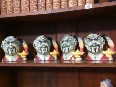 Four Royal Doulton toby jugs 'The Genie'