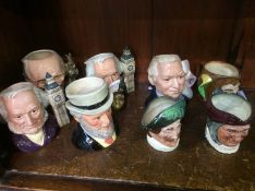 Eight small Royal Doulton toby jugs