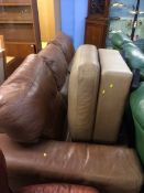Brown leather three seater settee and footstool